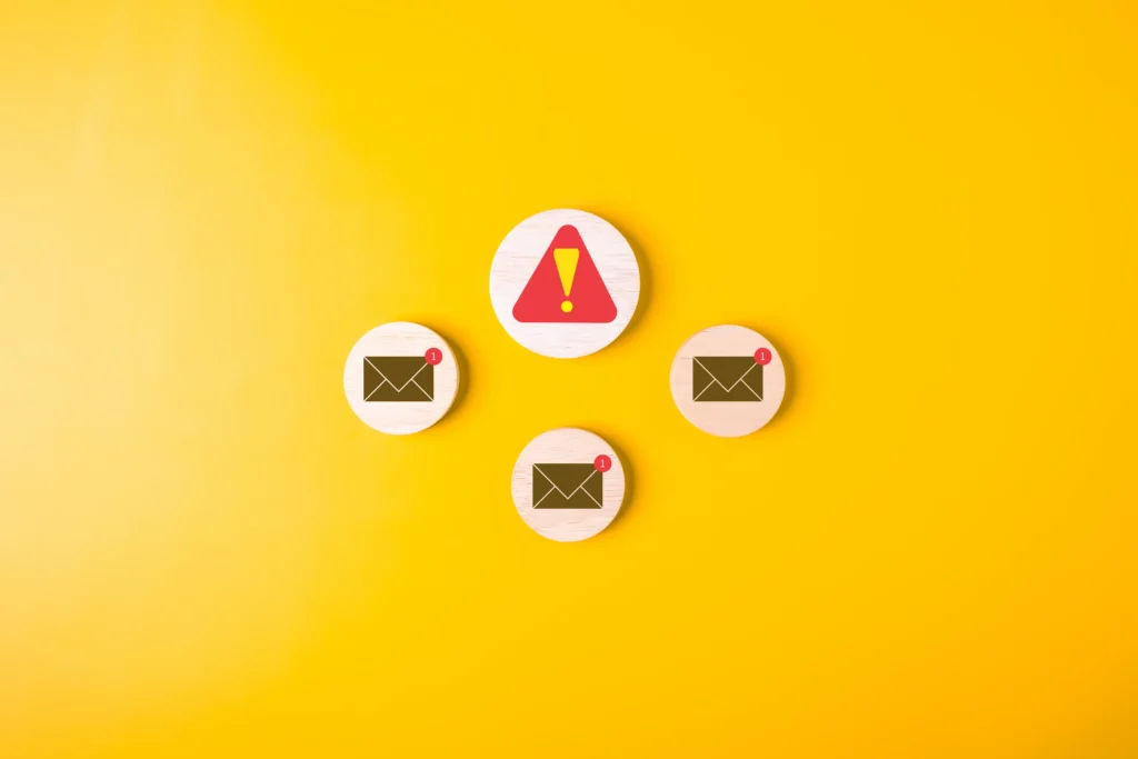 Minimalist concept graphic depicting email notification alerts and critical system security warnings.