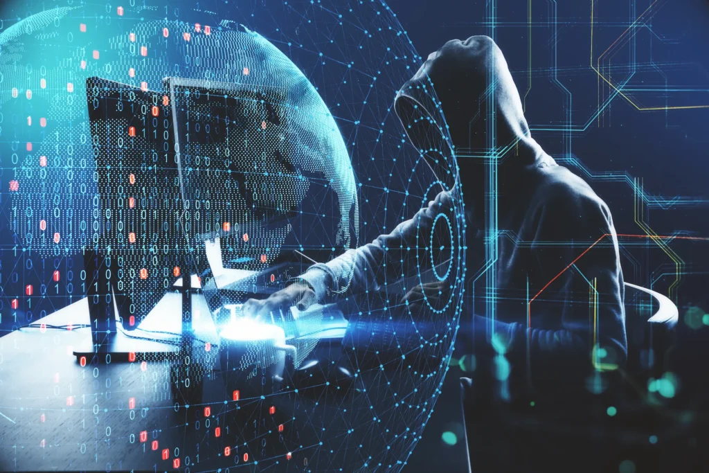 Cyber threat and global network hacking concept illustration with a hooded hacker at a workstation.