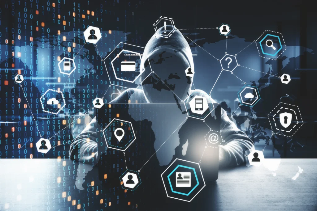 Cyber threat and global network hacking concept graphic with a hooded figure at a computer.